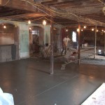 Pouring concrete in the basement