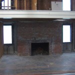 Uncovering the Mezzanine and fireplace in the future dining