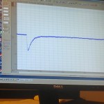 Electrophysiology is a technique where electrical recordingins are taken from individual cells as they are treated with chemicals and/or electricity. This computer monitor is showing a cell's response.