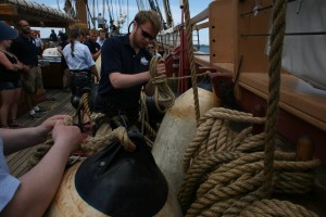 Gasket coiling the line of a fender shortly after casting off for my final sail aboard the Niagara. Photo by Cheryl Hatch/Copyright 2016